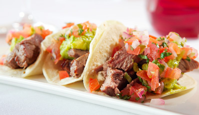 $35 - Zagat-Praised Latin Bistro Dinner for 2, Reg. $84