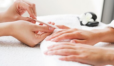 $15 -- Luxe Manicure at Exquisite Salon and Spa, Reg. $60