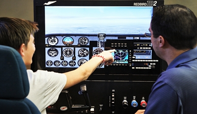 $18 -- Flight Simulator: Land a Plane at Midway, Reg. $45